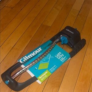 Grey and Blue Oscillating Sprinkler